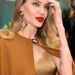 Angelina Jolie Channels Maria Callas In A Flower Brooch, Faux Fur Stole at Venice Film Festival