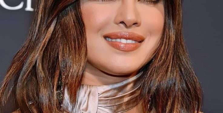 Priyanka Embraces Winter Glam in Chic Ivory Ensemble with Fur Accents