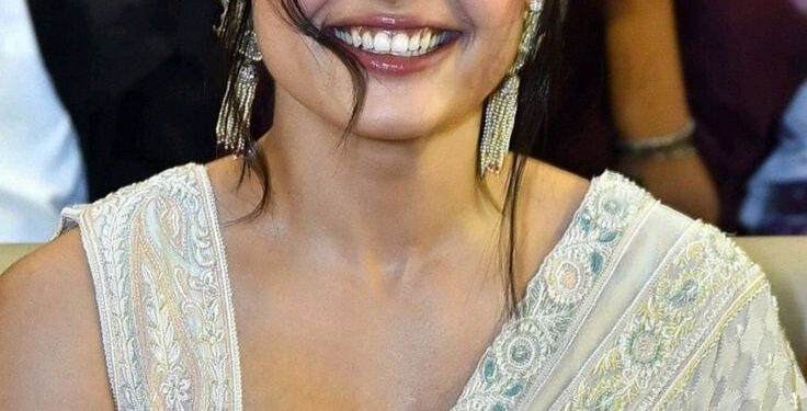 Rashmika in a Deep Maroon Saree for Pushpa 2 Promotions