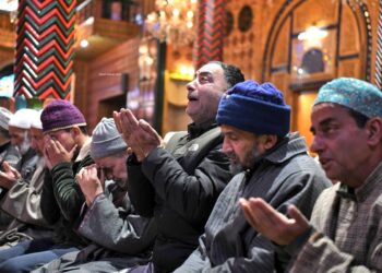 People recite the holy quran inside the shrine during the holy month of Ramadan in Srinagar