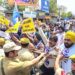 Police stop Aam Aadmi Party supporters during a protest against PDP and BJP, in Jammu.