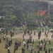 At least 19 killed, over 100 suffer burn injuries after Bangladesh Air Force aircraft crashes on college campus in capital Dhaka